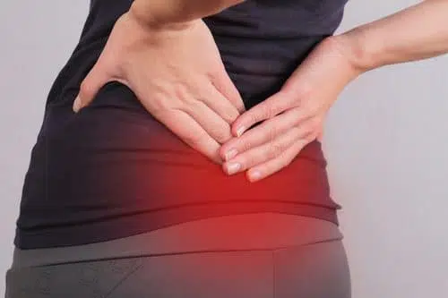 Female having a low back pain due to degenerative disc disease.