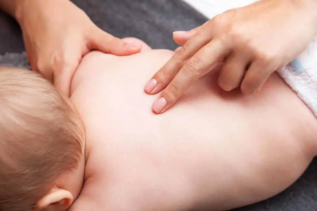 Baby receiving pediatric chiropractic care at Zaker Chiropractic
