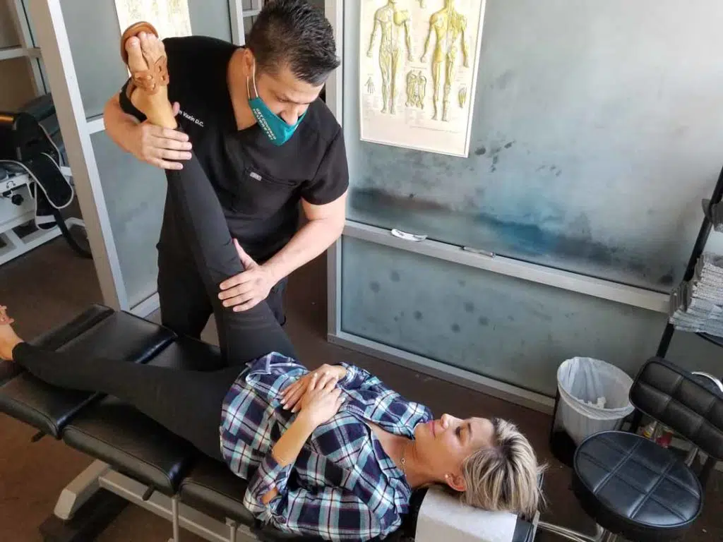 Chiropractor at Zaker doing some chiropractic treatment to the patient