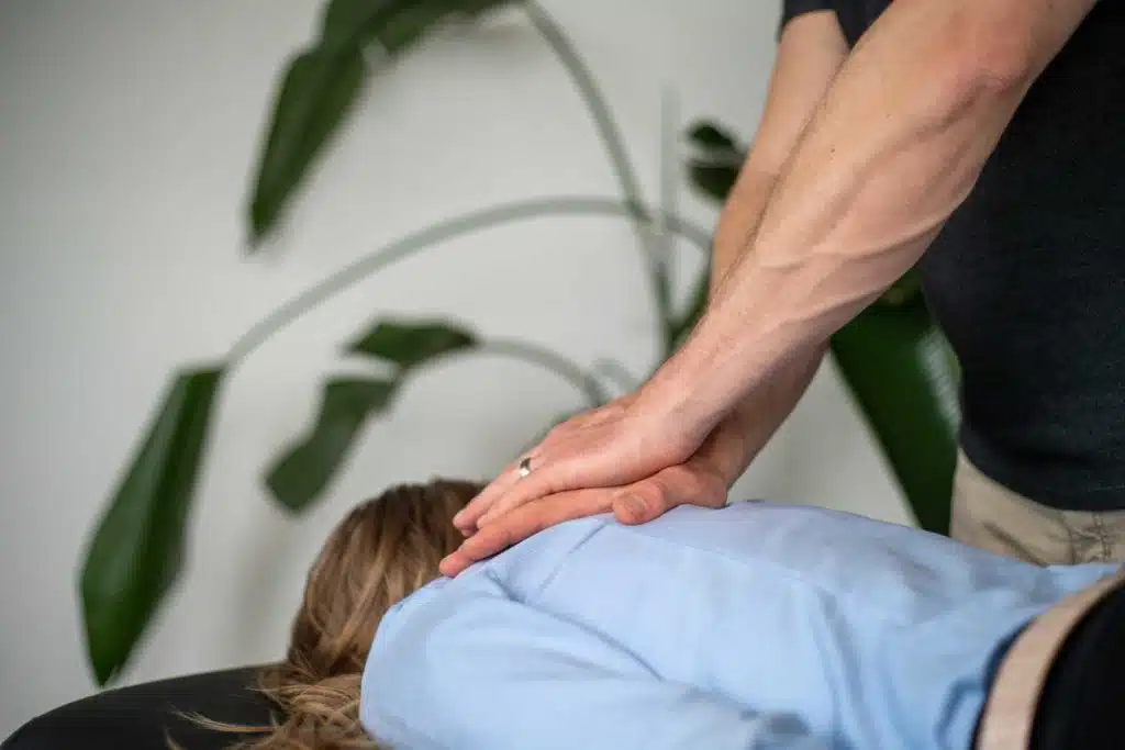 Chiropractor is treating a worker that suffers injury at work
