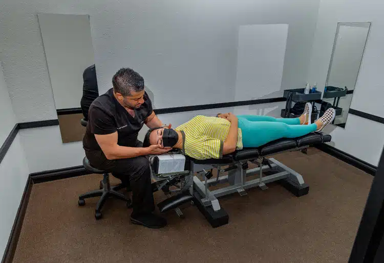 Chiropractor Perform Chiropractic Adjustments to his Patient		