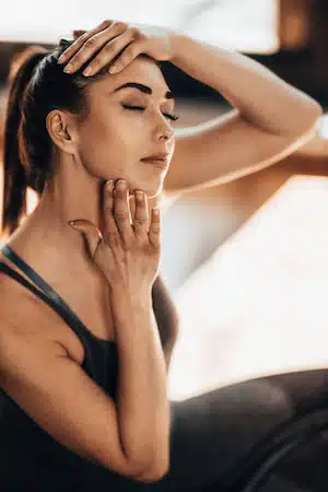 woman doing Neck Stretches and Exercises