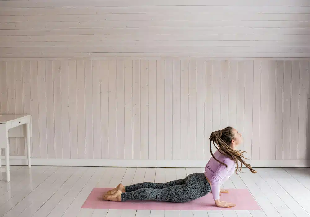 Woman doing some yoga exercise 