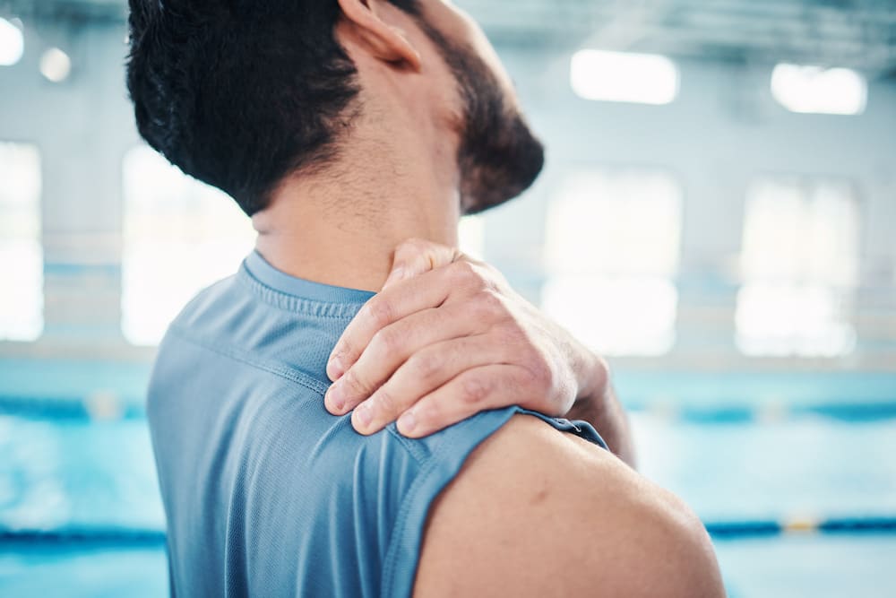 swimmer athlete experiencing neck pain