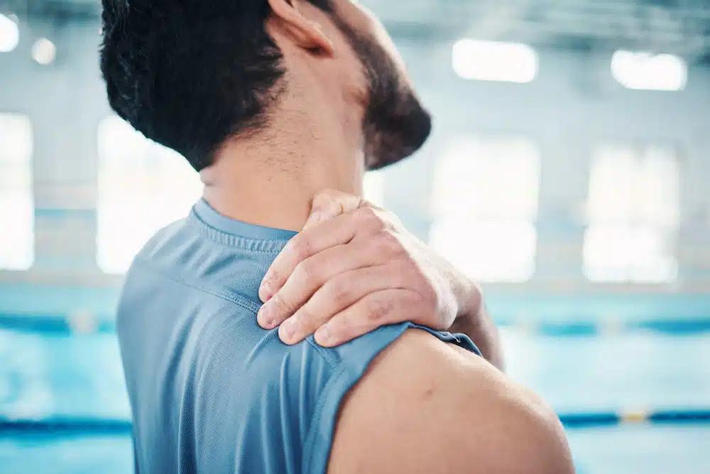 swimmer athlete experiencing neck pain