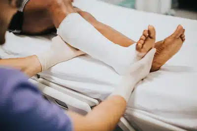 man injured from slipping having sprained foot