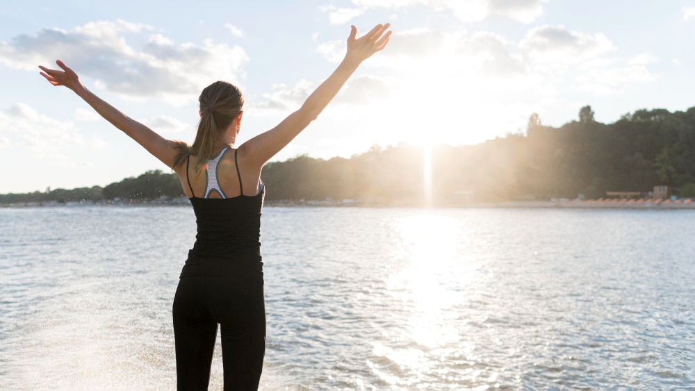 athletic woman enjoying the sunshine