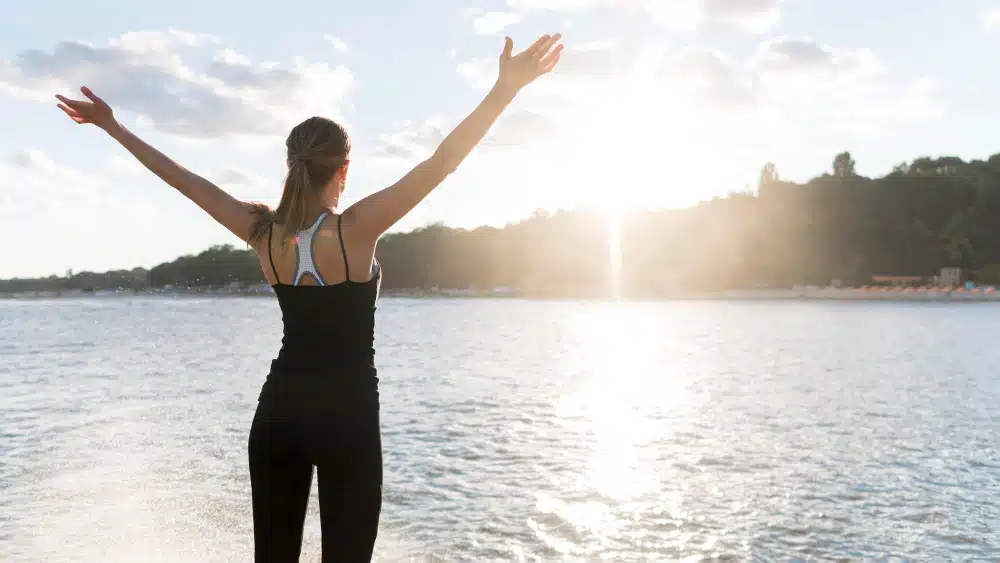 athletic woman enjoying the sunshine