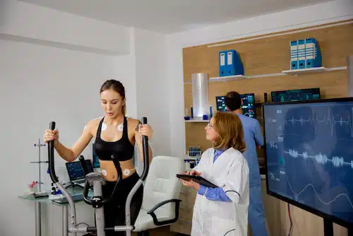 Nerve Conduction Velocity Test conducted to a woman during exercise